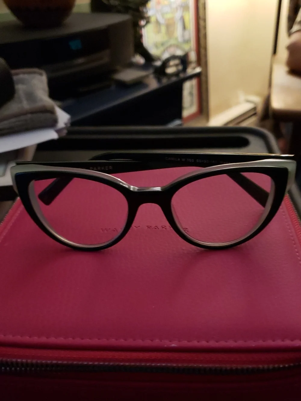Warby Parker Black and Gold Cat-Eye Glasses with Pink Lenses
